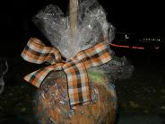 pumpkin wrapped in plastic to look like a candy apple